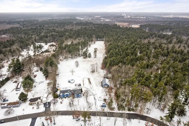 a view of a backyard of snow