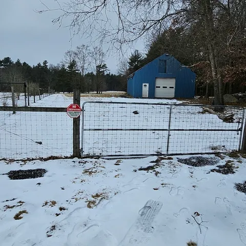 a wooden house with a outdoor space