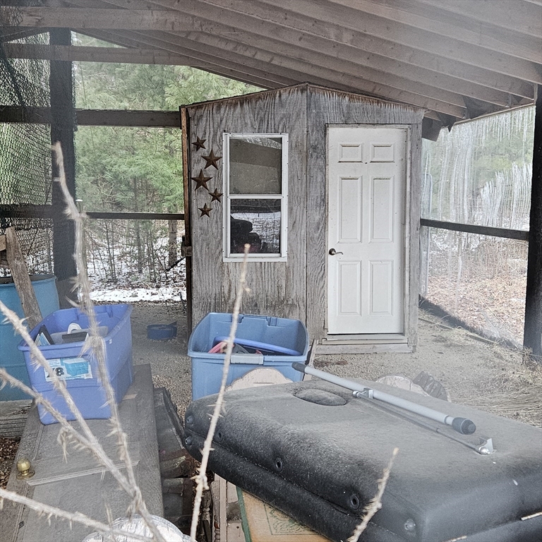 0 Murdock Street Middleboro, MA 02346 - Photo 24 of 30 a living room with a bed and furniture