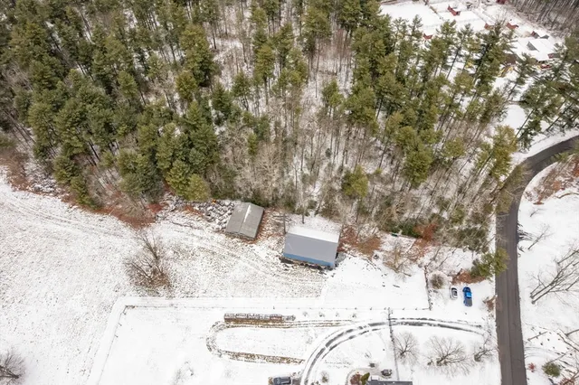 a view of a backyard of snow