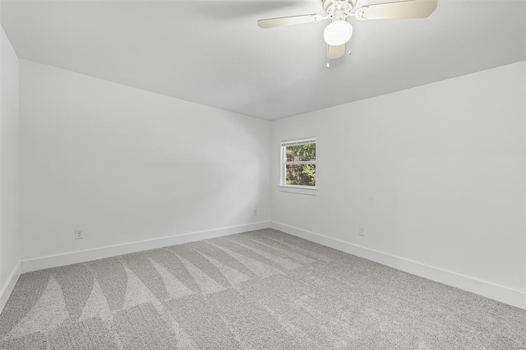 1509 Shirley Way Bedford, TX 76022 - Photo 20 of 26 Unfurnished room with carpet flooring and a ceiling fan
