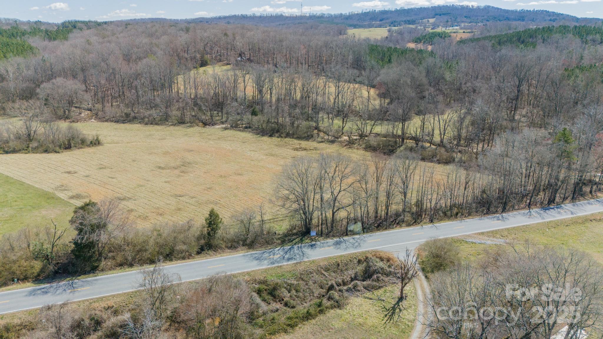 0 North Mountain Street Blacksburg, SC 29702 - Photo 24 of 27 a view of a dry yard with wooden fence