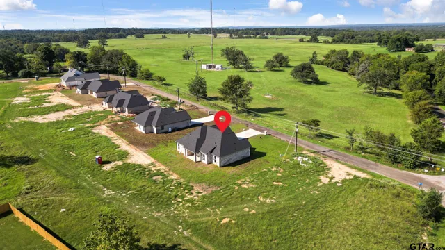 a view of a lake with a swimming pool