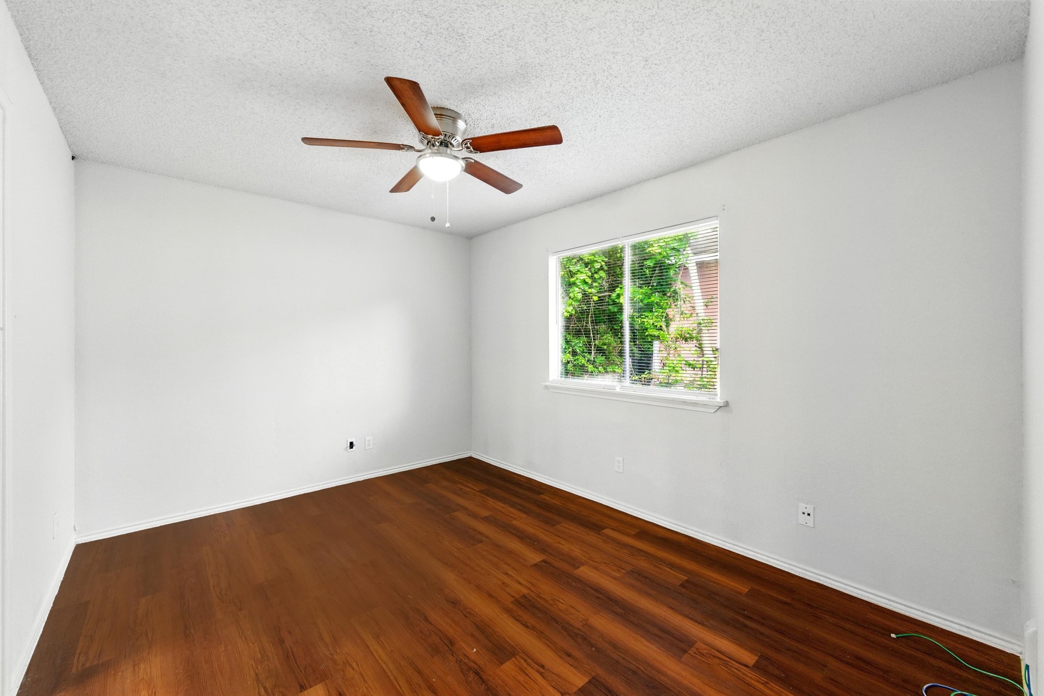5707 Spring Meadow Road Austin, TX 78744 - Photo 14 of 21 an empty room with a window