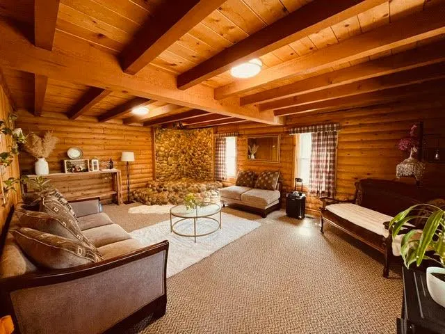 a view of a patio with couches and chairs