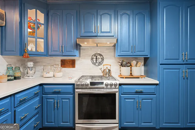 a kitchen with a sink and a window