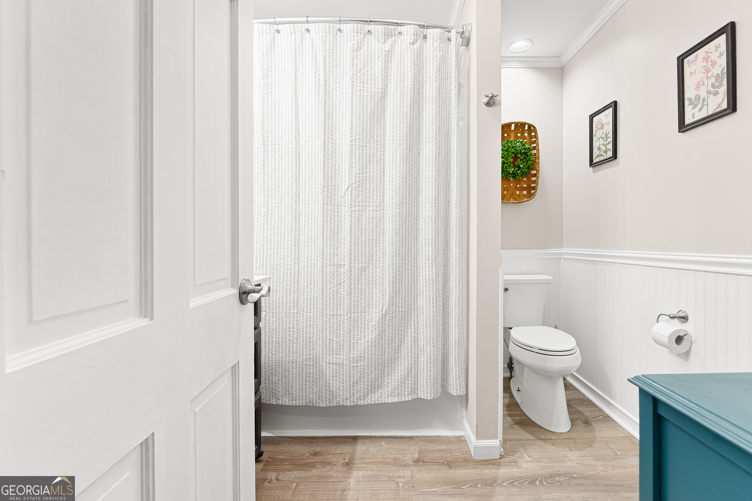 470 Benson Street Hartwell, GA 30643 - Photo 21 of 58 a bathroom with a shower curtain