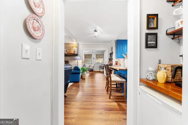 a view of a livingroom with furniture and wooden floor