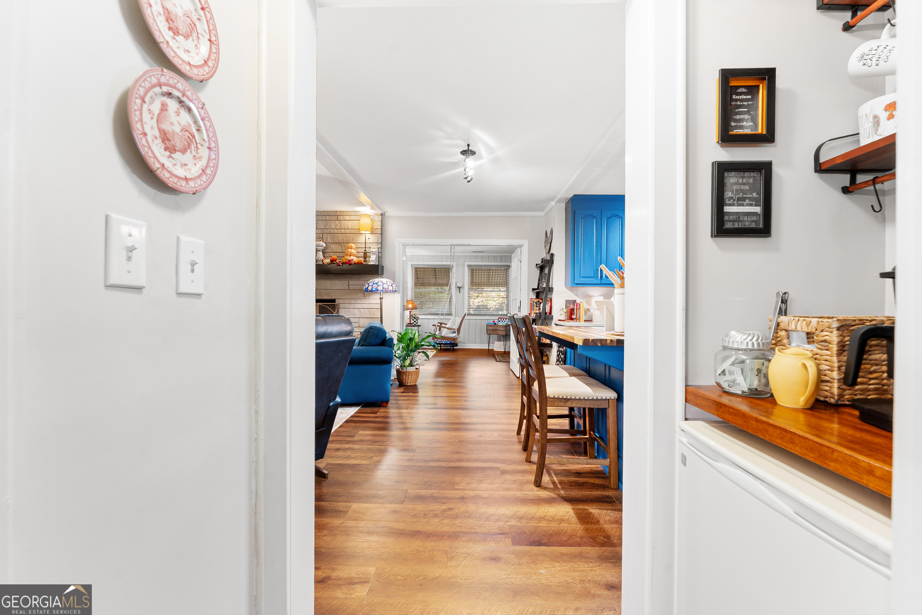 470 Benson Street Hartwell, GA 30643 - Photo 32 of 58 a hallway with a dining table and chairs