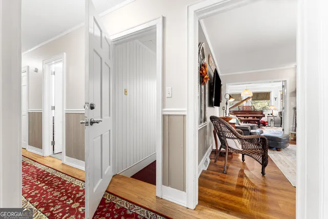 a kitchen with stainless steel appliances granite countertop a sink a refrigerator and a stove