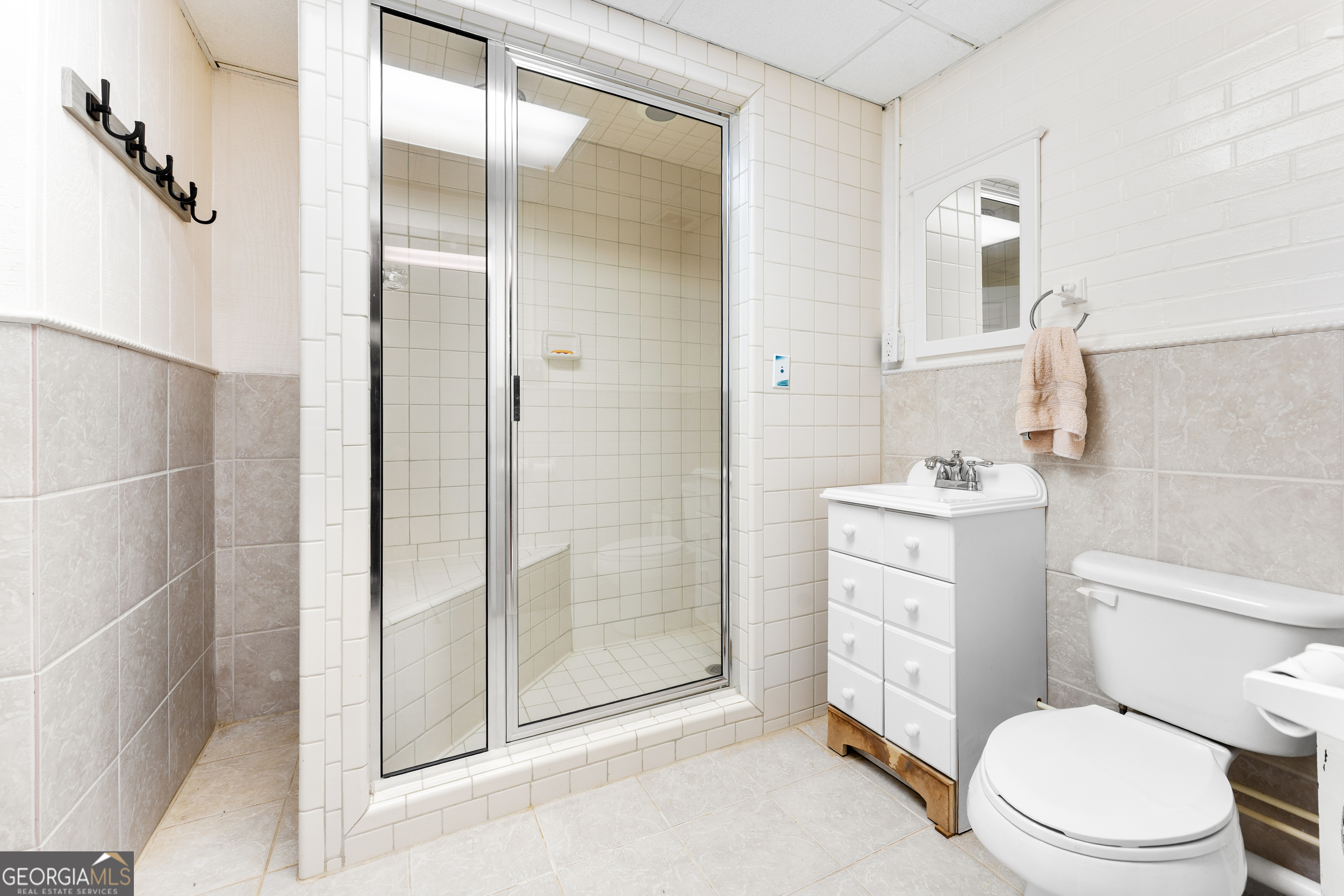 470 Benson Street Hartwell, GA 30643 - Photo 37 of 58 a bathroom with a toilet a sink and shower