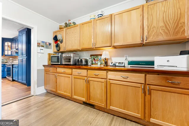 a patio with patio lots of furniture and wooden floor