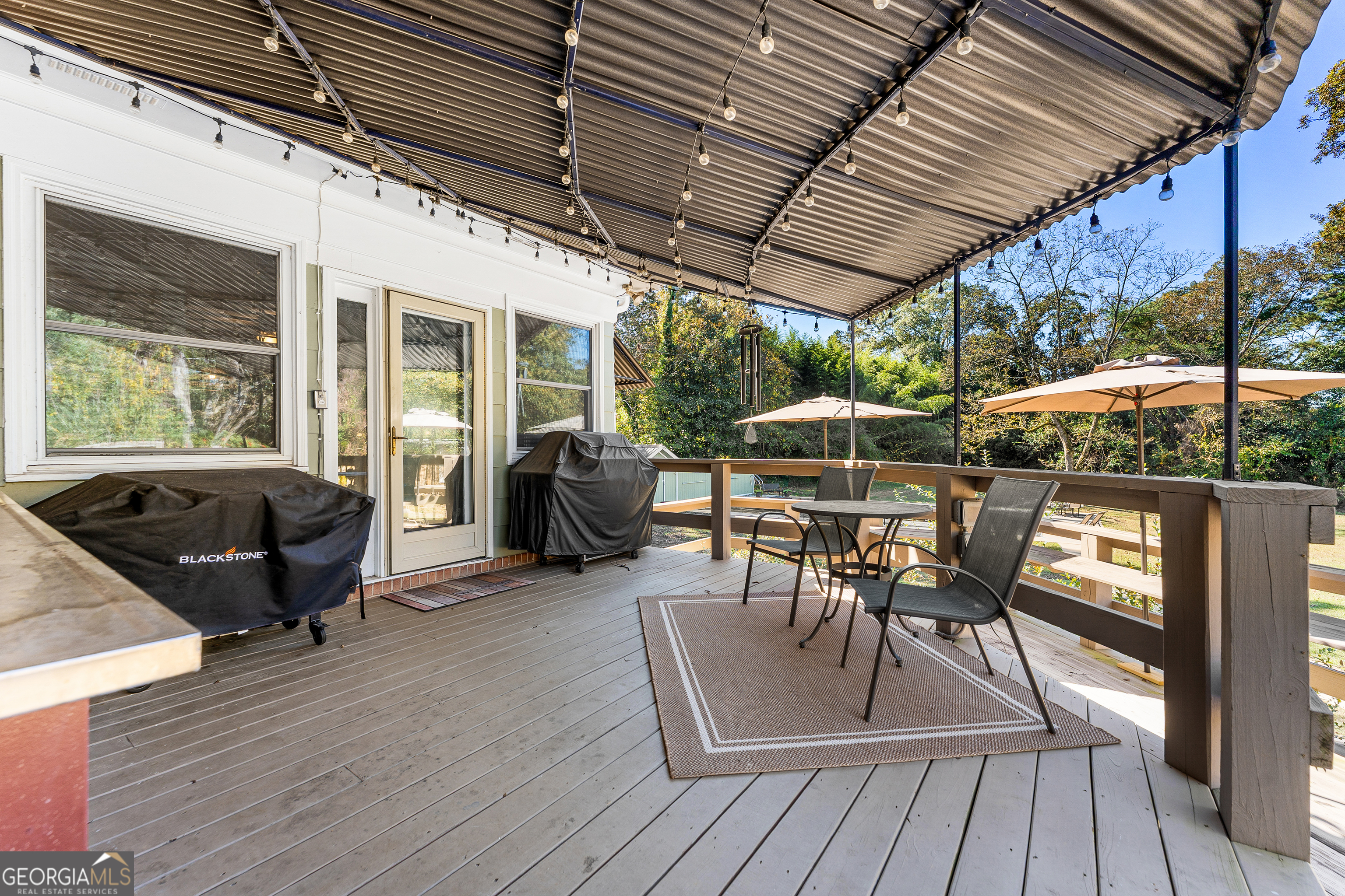 470 Benson Street Hartwell, GA 30643 - Photo 44 of 58 a patio with patio lots of furniture and wooden floor