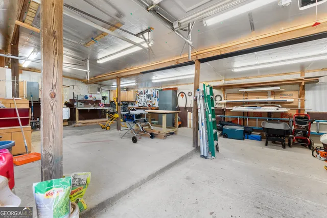 a sign that is sitting on a shelf in the middle of a yard