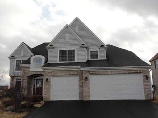 39W341 Preston Circle Geneva, IL 60134 - Photo 1 of 16 a front view of house with yard