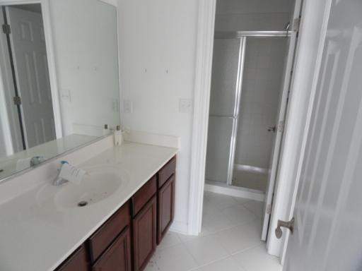 39W341 Preston Circle Geneva, IL 60134 - Photo 14 of 16 a bathroom with a double vanity sink and mirror