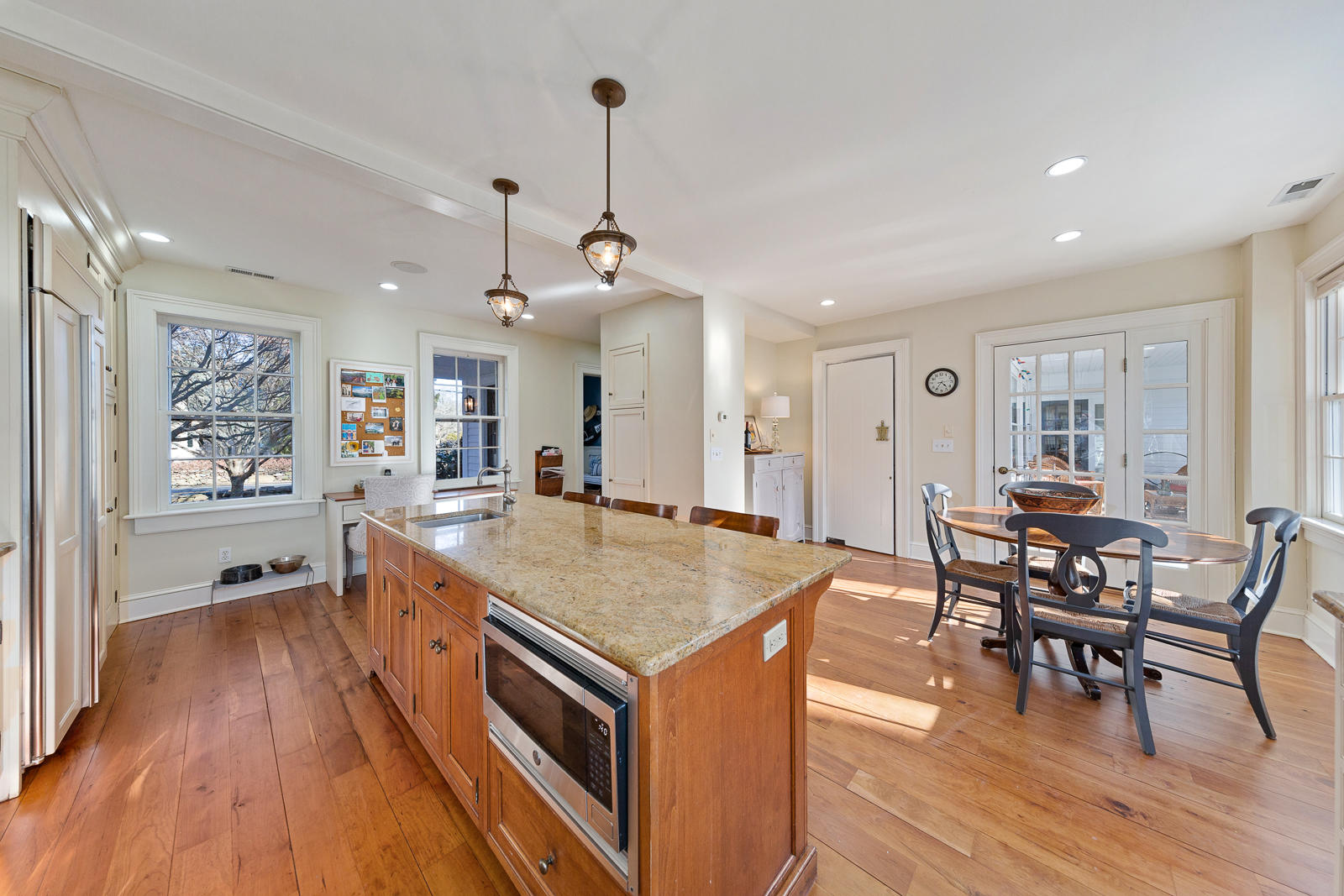 8 Rings End Road Darien, CT 06820 - Photo 8 of 42 a living room with stainless steel appliances granite countertop furniture wooden floor and a kitchen view