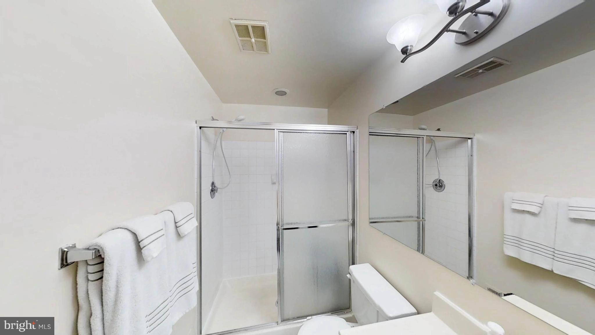 14924 Habersham Circle Silver Spring, MD 20906 - Photo 22 of 27 a bathroom with a tub and shower