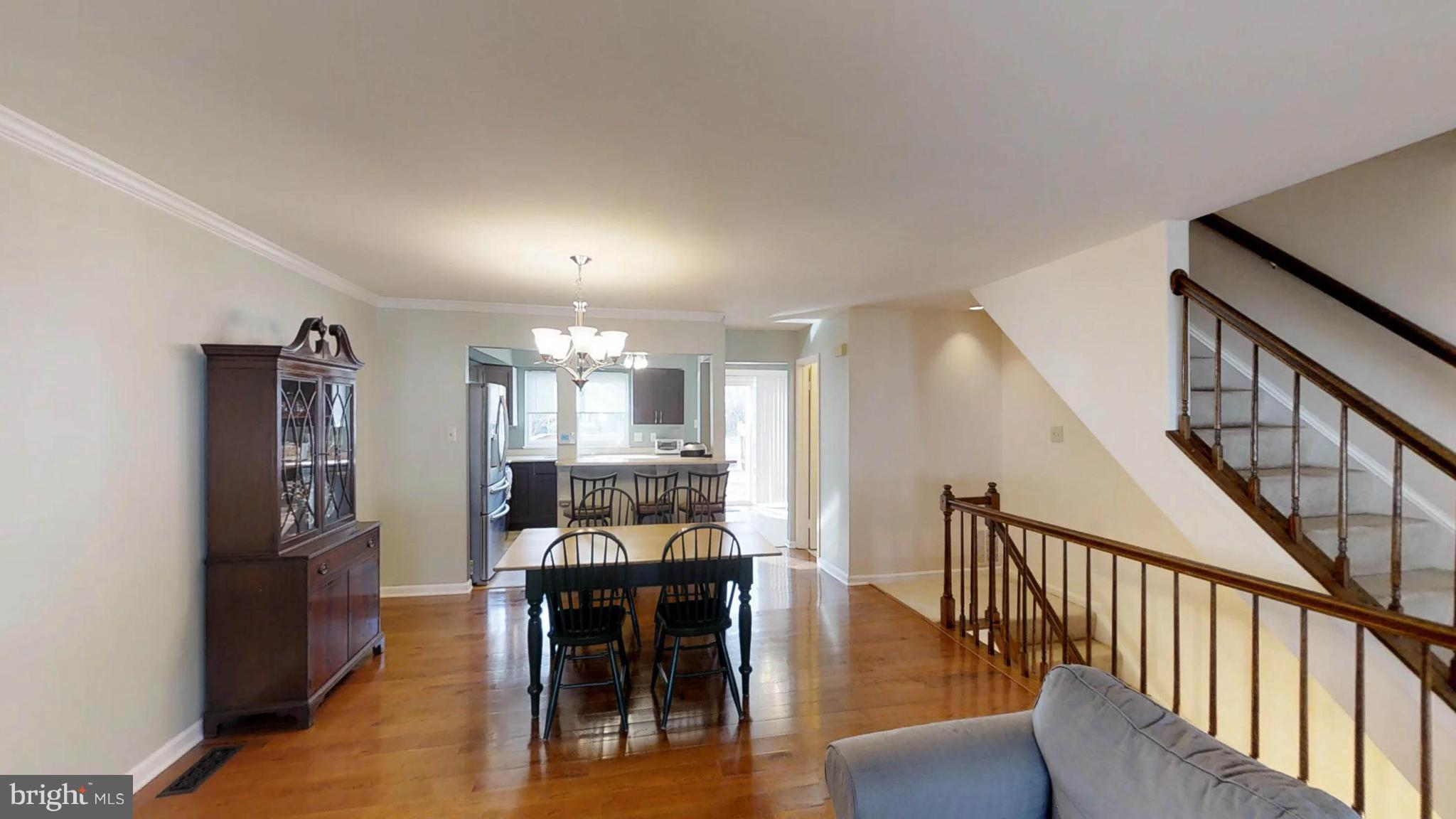 14924 Habersham Circle Silver Spring, MD 20906 - Photo 6 of 27 a view of a dining room with furniture and wooden floor