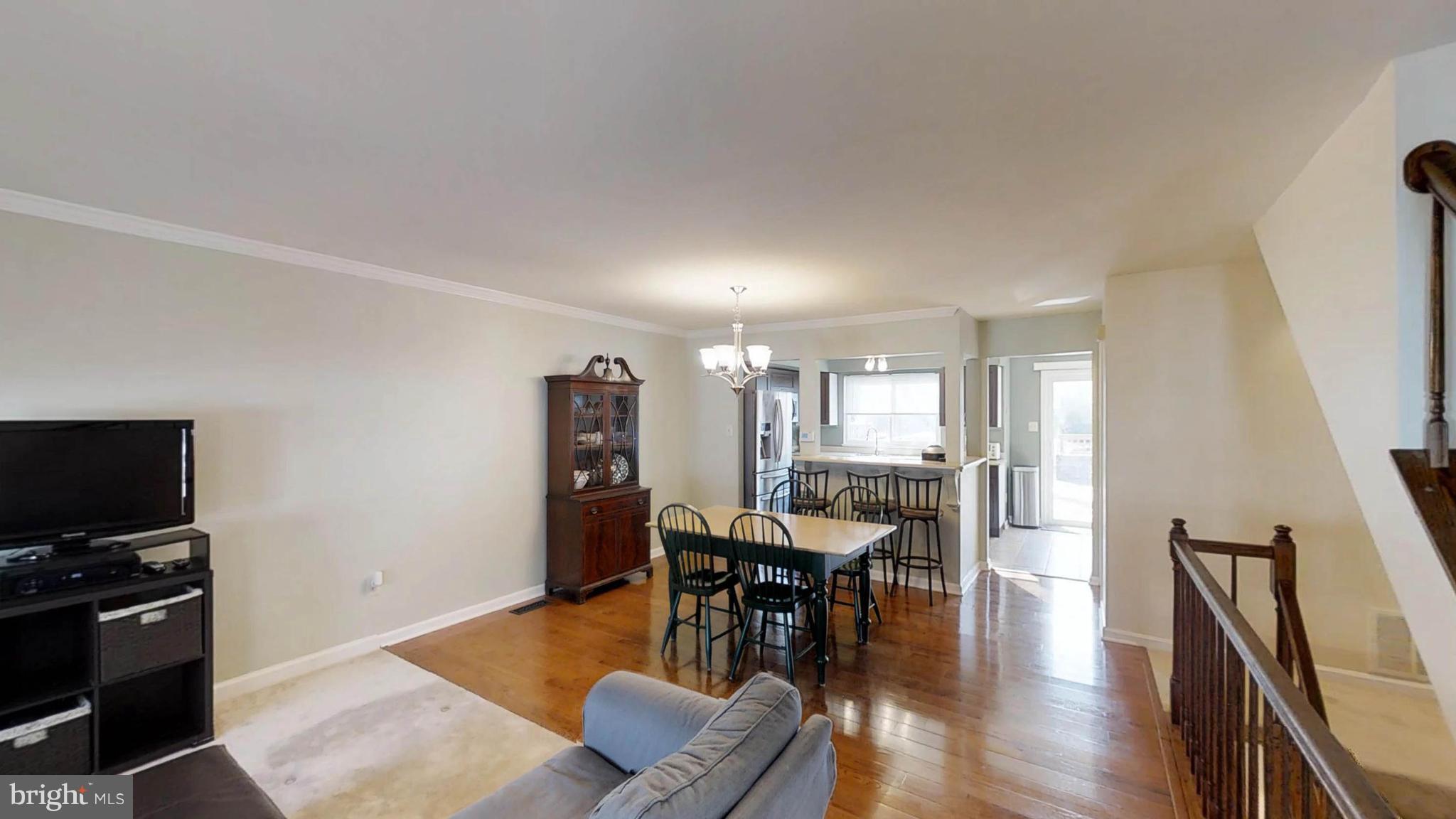 14924 Habersham Circle Silver Spring, MD 20906 - Photo 10 of 27 a dining room with furniture and wooden floor