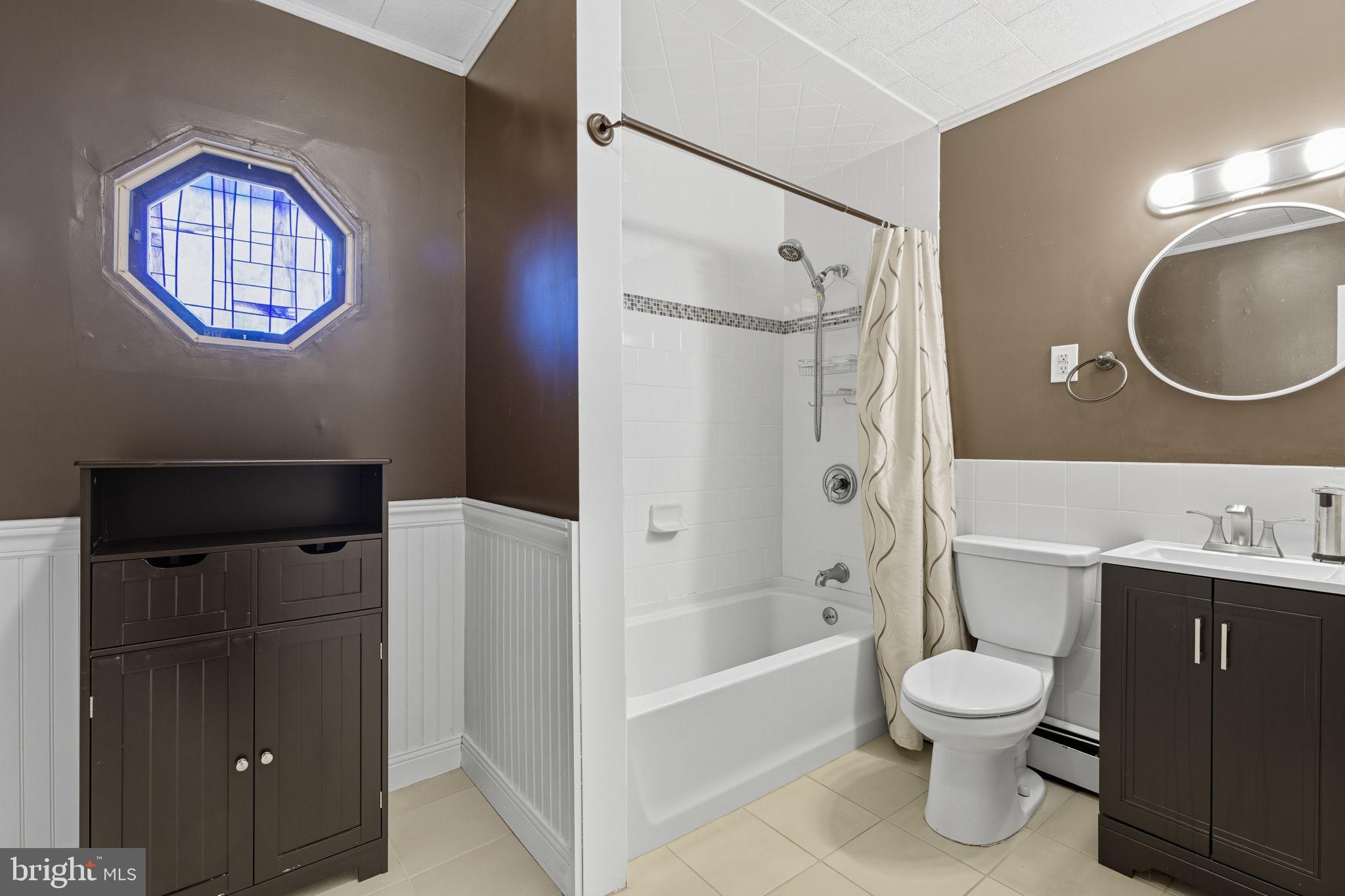 9 Newberry Lane Levittown, PA 19054 - Photo 13 of 36 a bathroom with a toilet a sink and bathtub