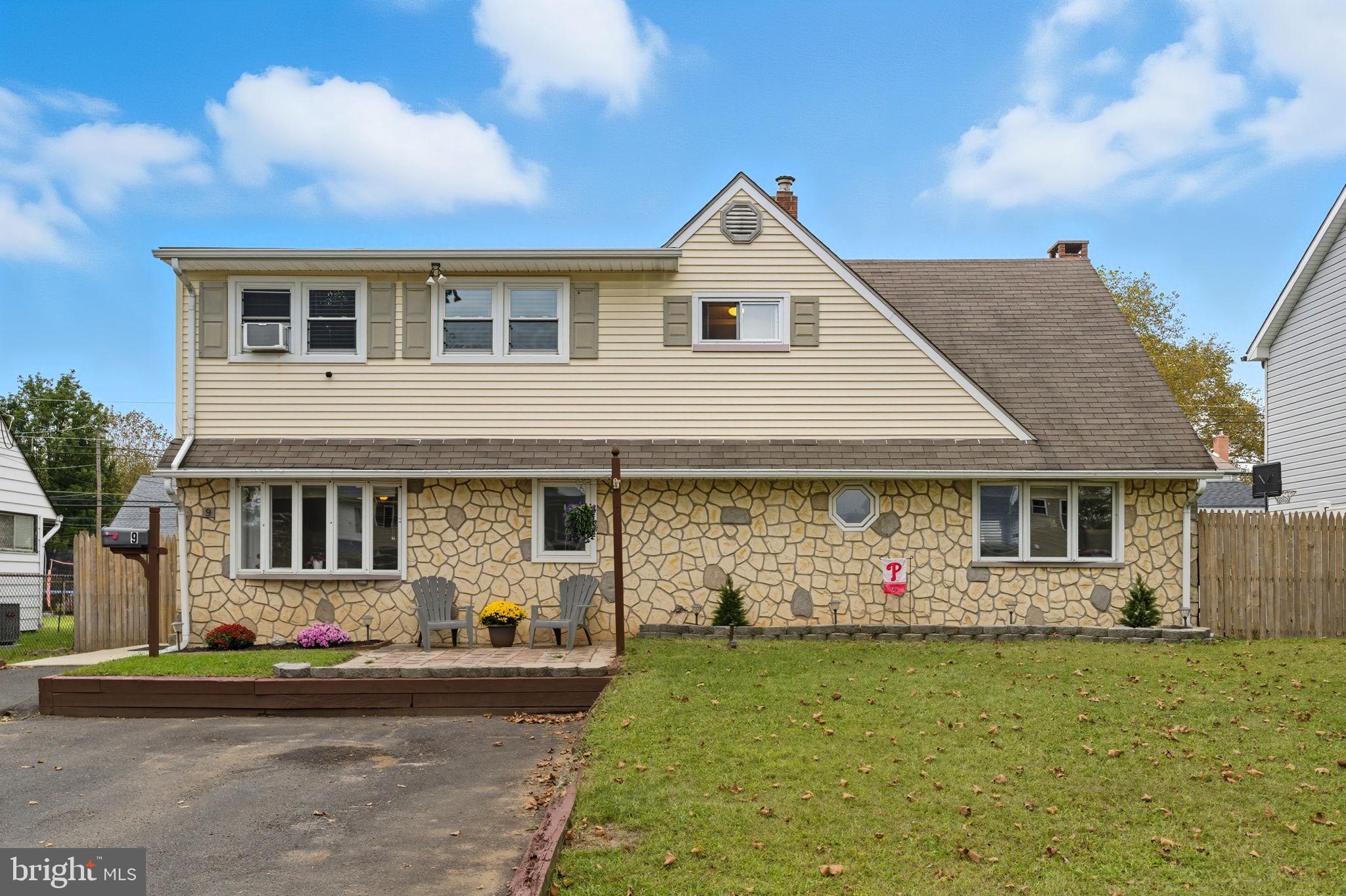 9 Newberry Lane Levittown, PA 19054 - Photo 31 of 36 a front view of a house with garden