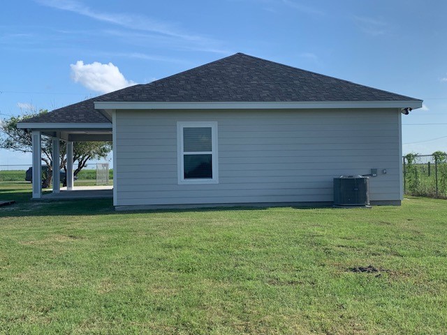 592 West Garrett Street Robstown, TX 78380 - Photo 3 of 15 a backyard of a house with lots of green space