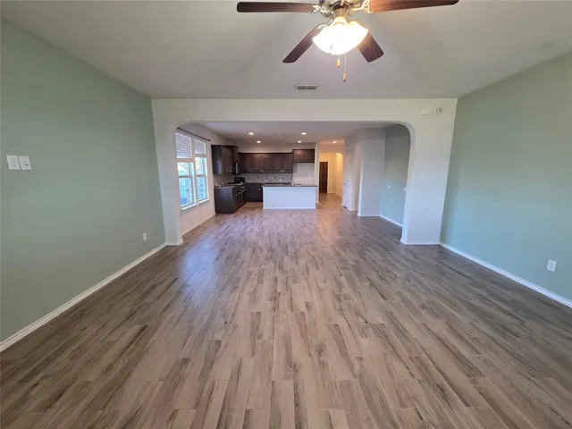 a view of a livingroom with wooden floor