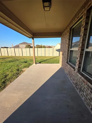 a house view with a backyard space