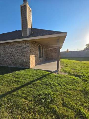 a front view of a house with pool