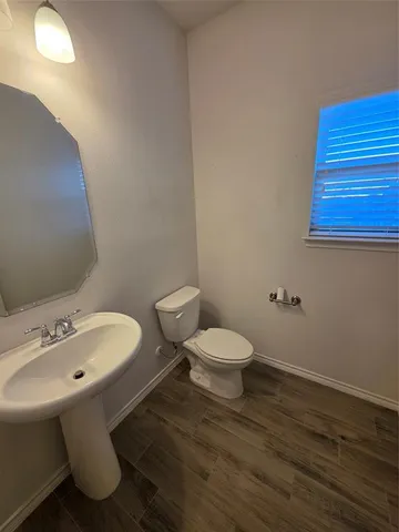 a bathroom with a sink and a toilet