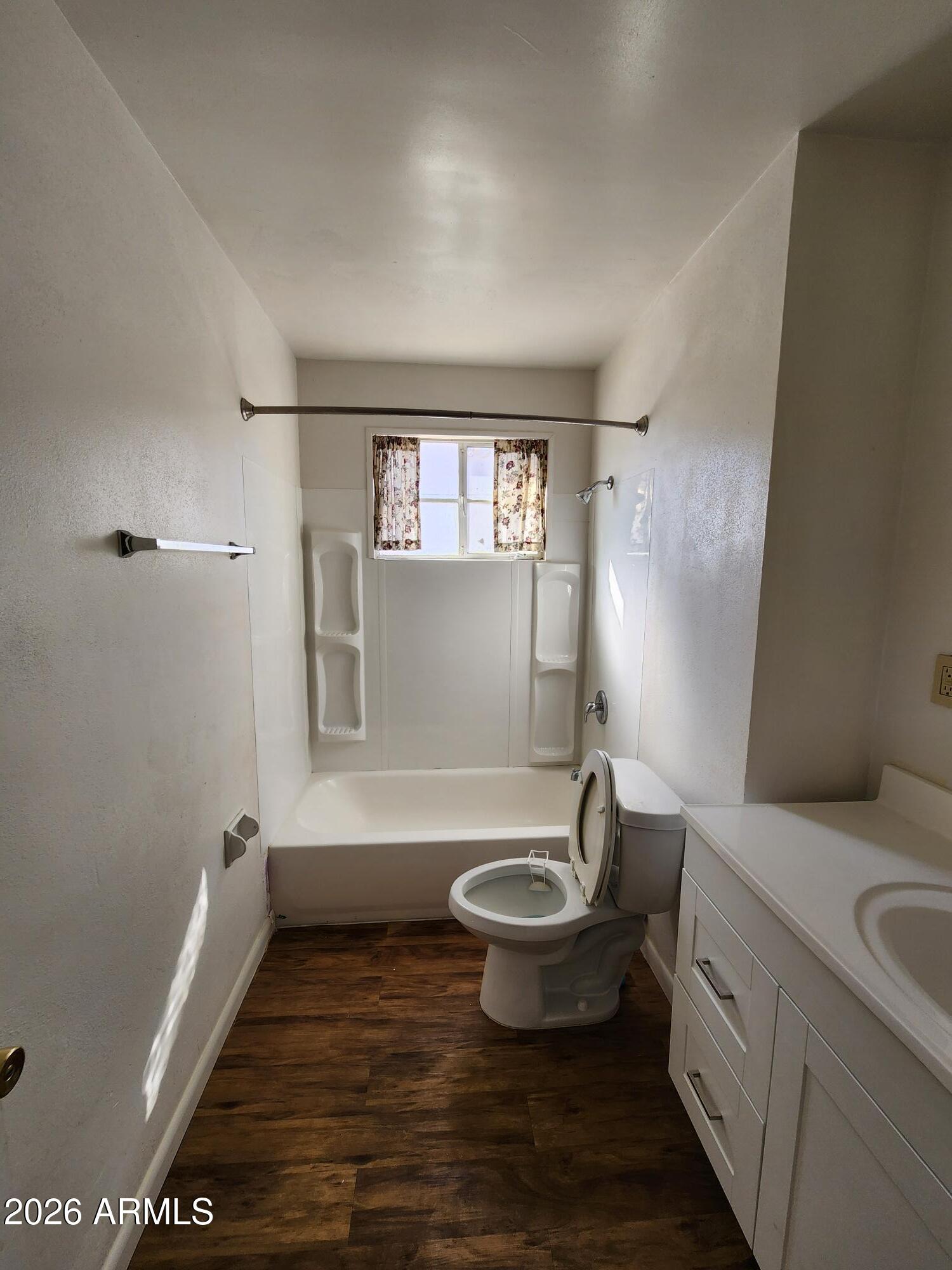 2032 West State Avenue Phoenix, AZ 85021 - Photo 8 of 18 a bathroom with a sink and mirror