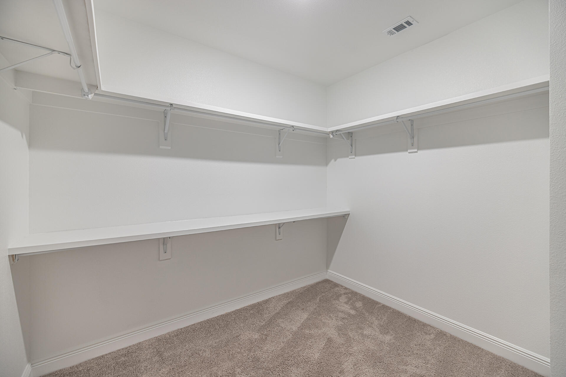 8959 Eureka Street Milton, FL 32583 - Photo 26 of 37 a view of an empty walk in closet