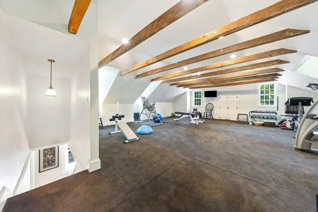 a view of living room with furniture and a window