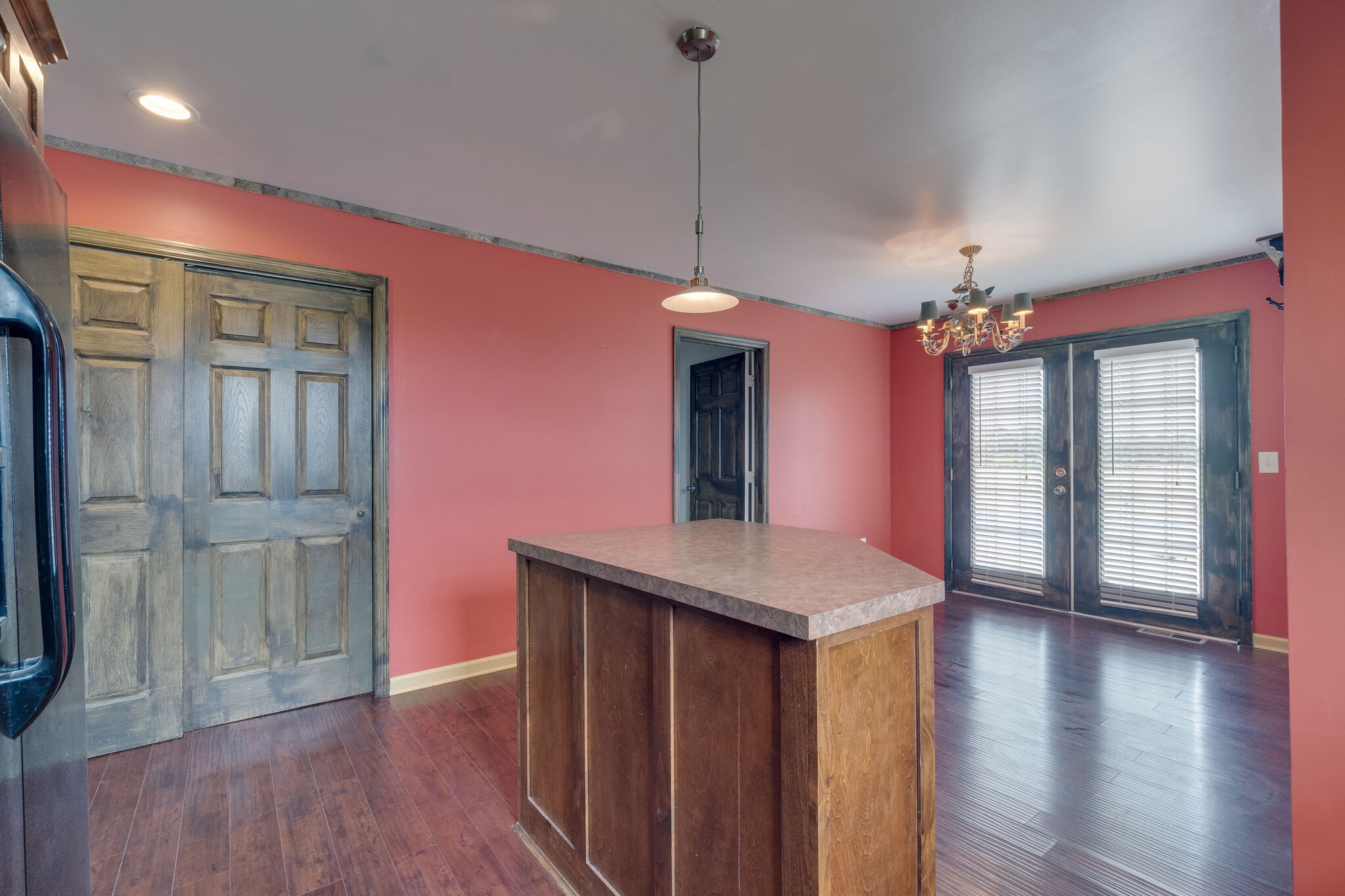 482 Rabbit Trail Road Leoma, TN 38468 - Photo 14 of 33 a view of a room with wooden floor and chandelier