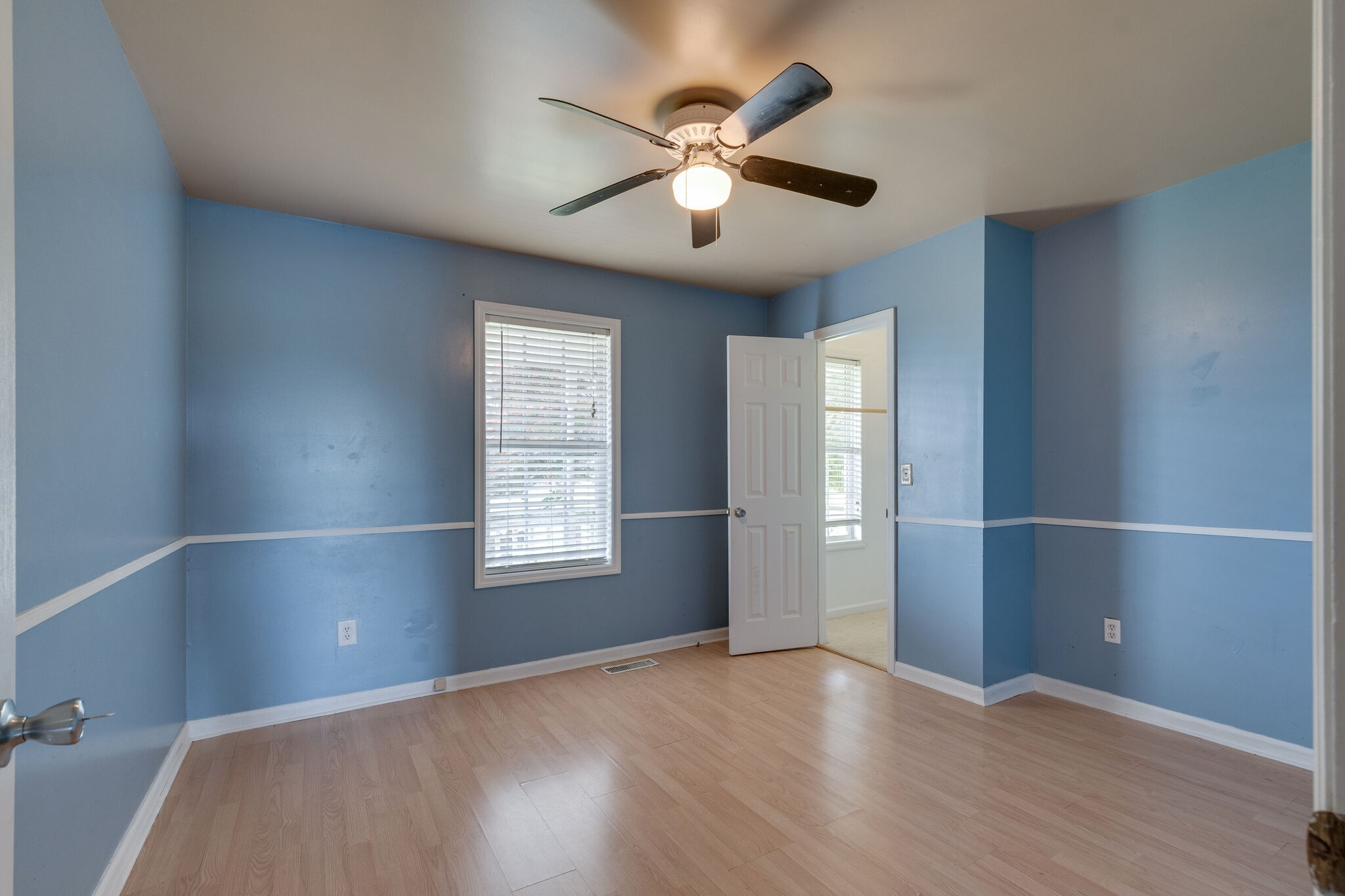 482 Rabbit Trail Road Leoma, TN 38468 - Photo 19 of 33 wooden floor in an empty room with a window