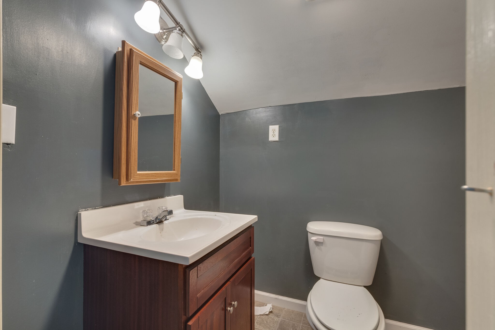 482 Rabbit Trail Road Leoma, TN 38468 - Photo 26 of 33 a bathroom with a toilet sink and mirror
