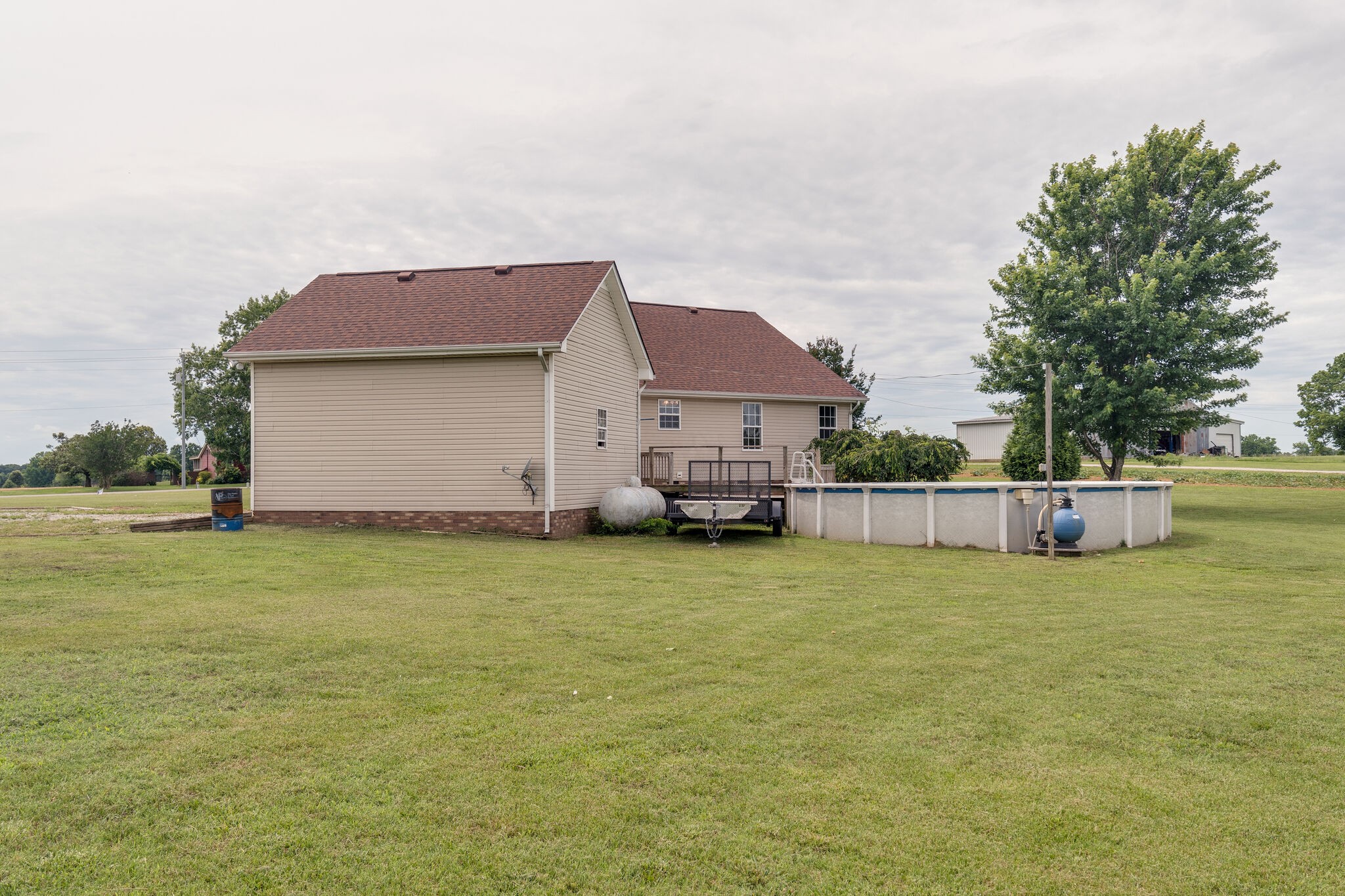 482 Rabbit Trail Road Leoma, TN 38468 - Photo 28 of 33 a view of a house with a yard and a large tree