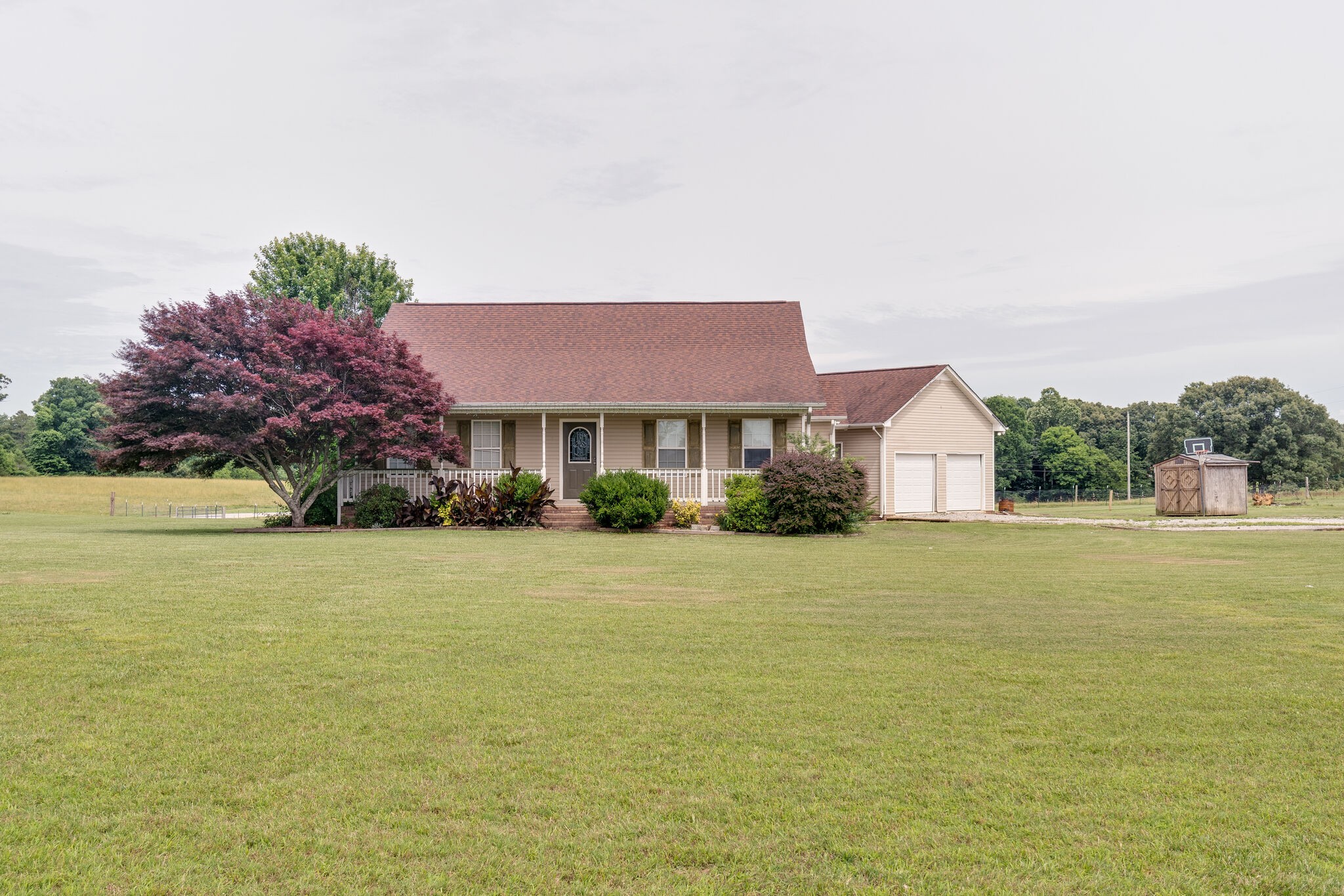 482 Rabbit Trail Road Leoma, TN 38468 - Photo 3 of 33 a front view of a house with a yard and lake view
