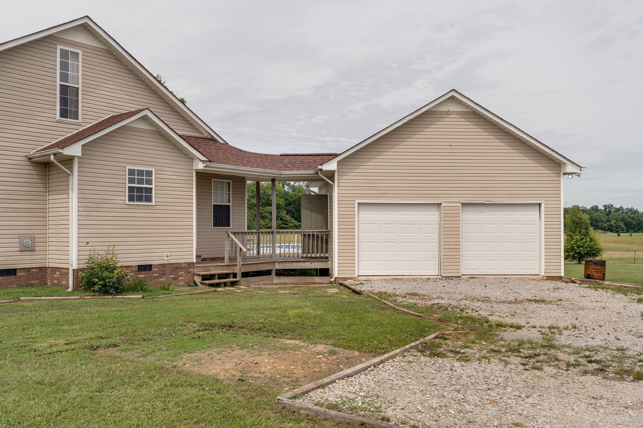 482 Rabbit Trail Road Leoma, TN 38468 - Photo 31 of 33 a front view of a house with a yard and garage