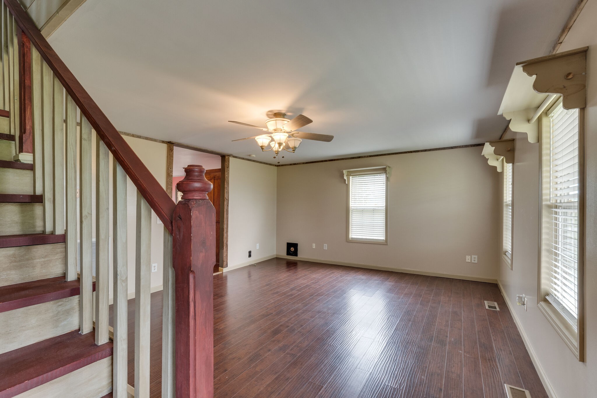 482 Rabbit Trail Road Leoma, TN 38468 - Photo 7 of 33 a view of an empty room with wooden floor and a window