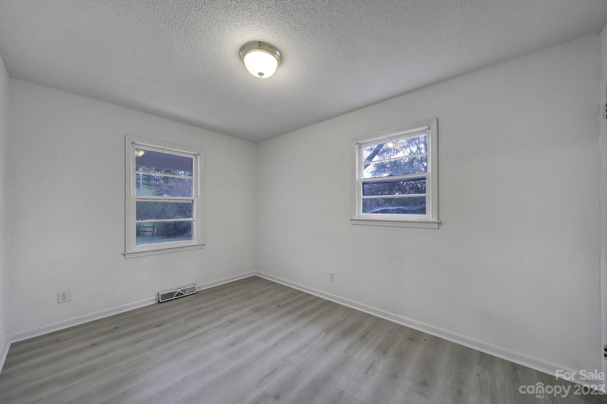 5119 State Rd S-46-557 Clover, SC 29710 - Photo 12 of 26 an empty room with a window
