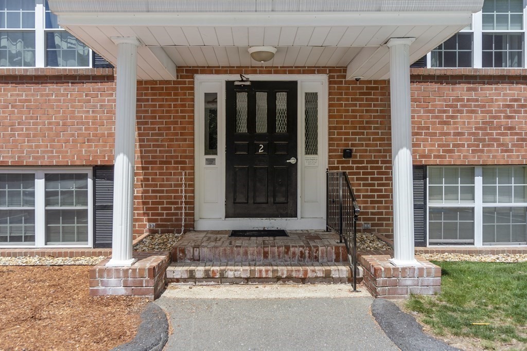 37 Leonard Road, Unit 37 Boxborough, MA 01719 - Photo 1 of 20 a front view of a house with a yard
