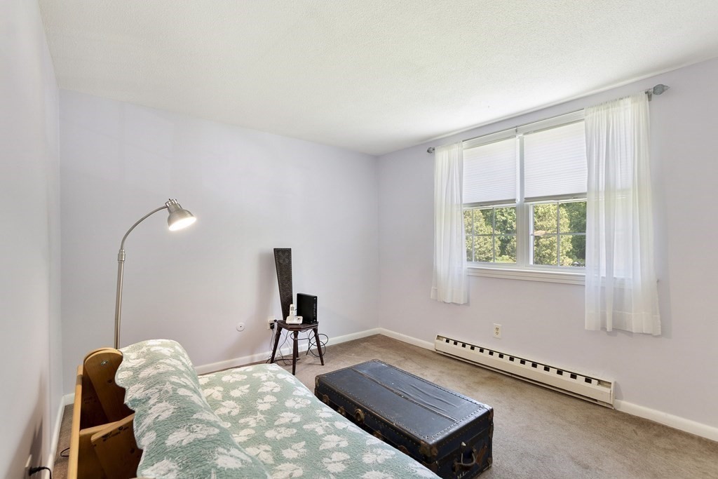 37 Leonard Road, Unit 37 Boxborough, MA 01719 - Photo 11 of 20 a very nice looking room with a large window