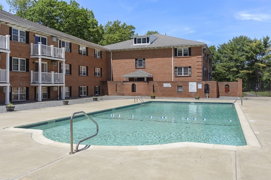 37 Leonard Road, Unit 37 Boxborough, MA 01719 - Photo 14 of 20 a view of a house with a backyard