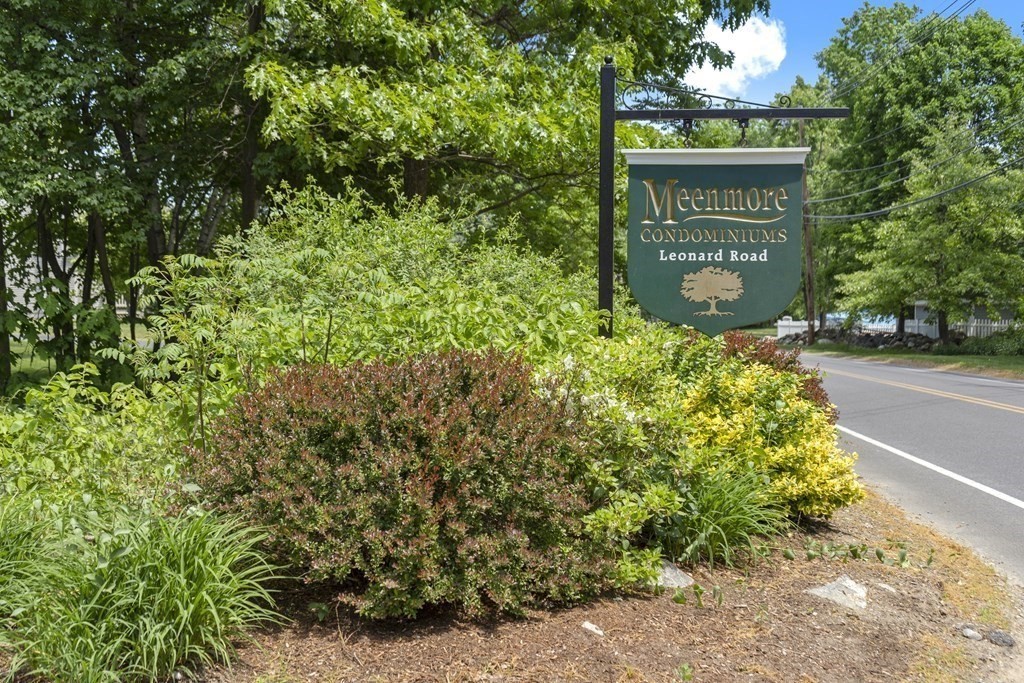 37 Leonard Road, Unit 37 Boxborough, MA 01719 - Photo 2 of 20 a sign that is sitting in front of a tree