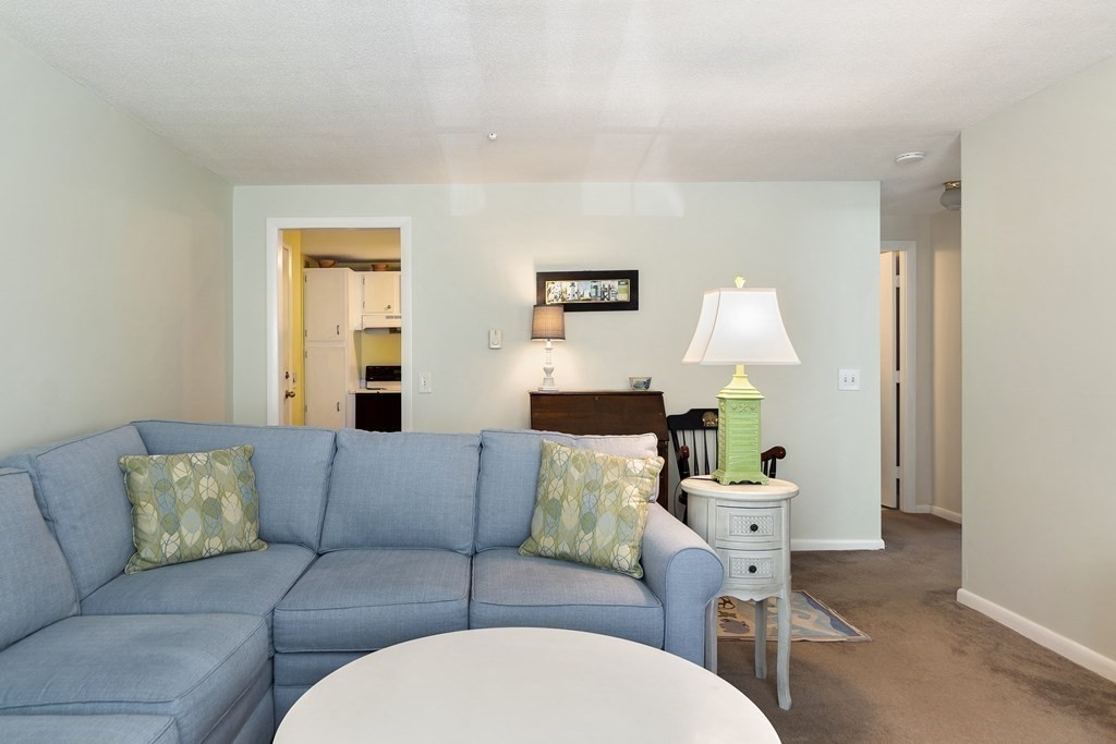 37 Leonard Road, Unit 37 Boxborough, MA 01719 - Photo 8 of 20 a living room with furniture