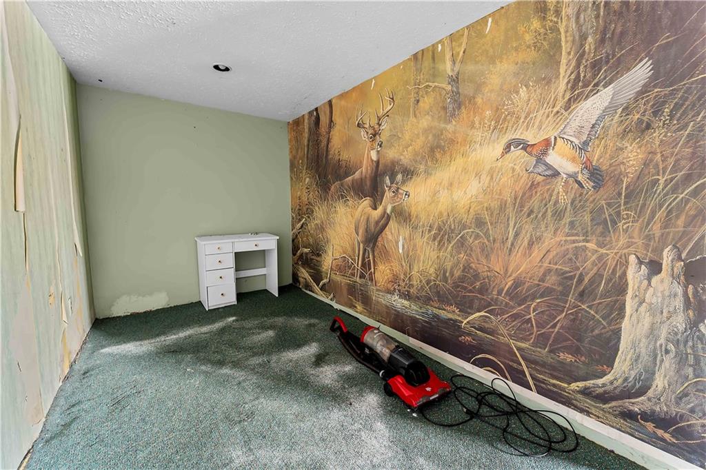 819 Bute Road Uniontown, PA 15401 - Photo 17 of 19 a view of a room with a tree