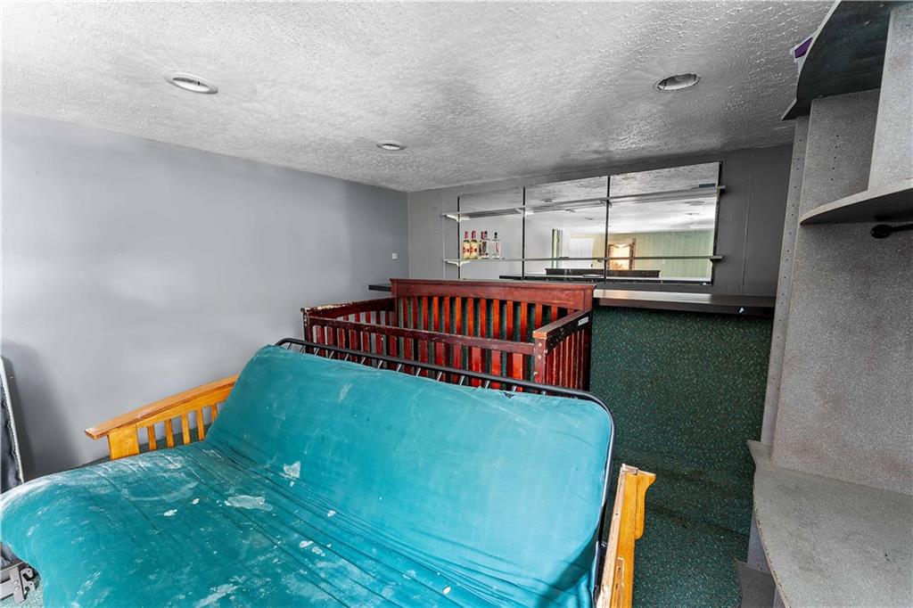 819 Bute Road Uniontown, PA 15401 - Photo 19 of 19 a bed room with furniture and a window