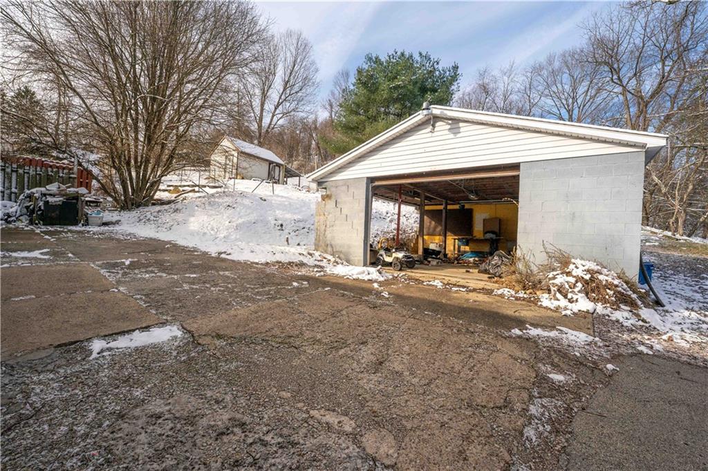 819 Bute Road Uniontown, PA 15401 - Photo 2 of 19 a view of a house with a yard and large tree
